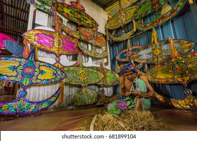 KELANTAN, MALAYSIA - 15TH JULY 2017; Unidentified Man Is Making The Traditional Moon Kite Or Locally Known As 