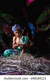 KELANTAN, MALAYSIA - 15TH JULY 2017; Unidentified Man Is Making The Traditional Moon Kite Or Locally Known As 