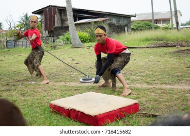 KELANTAN, MALAYSIA - 15TH JULY 2017; Unidentified Man Playing 