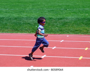 KELOWNA, CANADA - JULY 3:  Unidentified Child On Fun Run On 27th Annual Jack Brow Memorial Track And Field Meet July 3, 2011, Kelowna, Canada