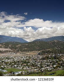 Kelowna Neighbourhood With A Golf Course And Mountains