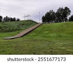 Kempele, Finland, August 25 2024. Morning run in the terrain surrounding the sports field and on the fitness stairs.