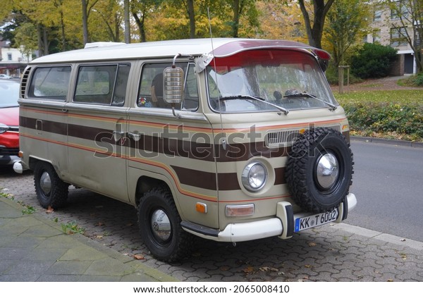 Kempen,Germany-October\
27,2021: Volkswagen bulli Type 2 second generation in Kempen,s a\
forward control light commercial vehicle introduced in 1967-1979 by\
the German automaker\
Volkswagen