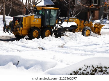 Ken Caryl Ranch, Colorado, USA,March 3, 2021, Jefferson County snow plow plowing road