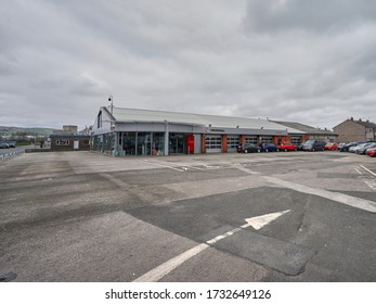 Kendal, Cumbria, UK - April 1 2020:An Almost Empty Car Sales Dealership Lot Due To The Effects Of The Coronavirus, Covid 19 Pandemic Which Forced Dealerships To Close                  