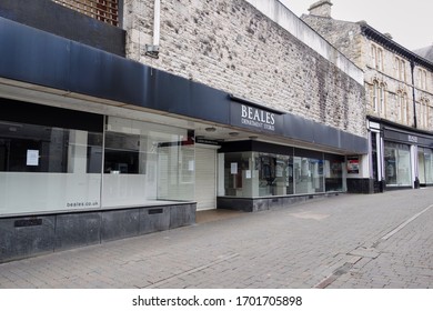 Kendal, Cumbria, UK - April 7 2020: Empty Street Showing The Closed Beales Department Store During The Coronavirus Pandemic, The Business Having Gone Into Administration In Early 2020              