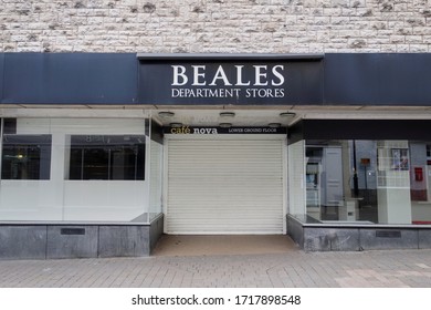 Kendal, Cumbria, UK - April 7 2020: Empty Street Showing The Closed Beales Department Store During The Coronavirus Pandemic, The Business Having Gone Into Administration