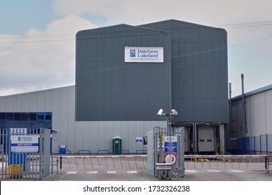 Kendal, Cumbria, UK - March 28  2020: The Large Grey Metal Frontage Of A Modern Dairy Foods Producing Business                        