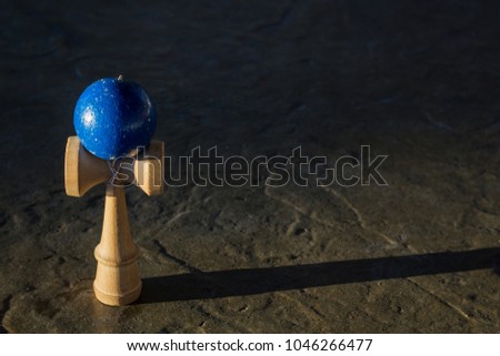 Kendama on a Stone Table
