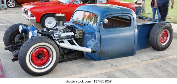 Kennedale,Texas - April 19,2019  Friday Night Classic Car And Hot Rod Show In Kennedale,Texas With People Looking At A Very Low Rider Truck..