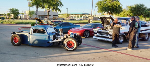 Kennedale,Texas - April 19,2019  Friday Night Classic Car And Hot Rod Show In Kennedale,Texas With People Looking At A Very Low Rider Truck..