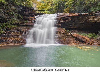 Kennedy Falls, a remote waterfall on the North Branch of West Virginia's Blackwater River, tumbles over mineral-stained rocks on a rainy autumn day.