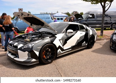 Kenosha, Wisconsin / USA - August 31, 2019:  A Customize Nissan GT R In Black White And Gray Camouflage Paint Scheme From The 2007 Through 2010 Body Style On Display At The Downtown Kenosha Car Show. 