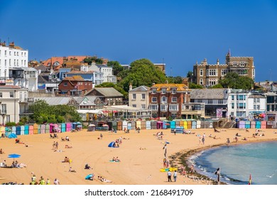 Kent, England - 14 June, 2022 - People enjoying sunshine on the sandy beach at Viking Bay in the seaside town of Broadstiars