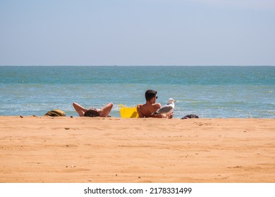 Kent, England - 14 June, 2022 - People sunbathing on the sandy beach of Viking Bay in the seaside town of Broadstairs