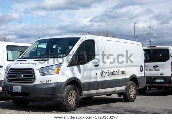 Kent, Washington / USA -April 3 2020: Seattle Times\
newspaper delivery vans