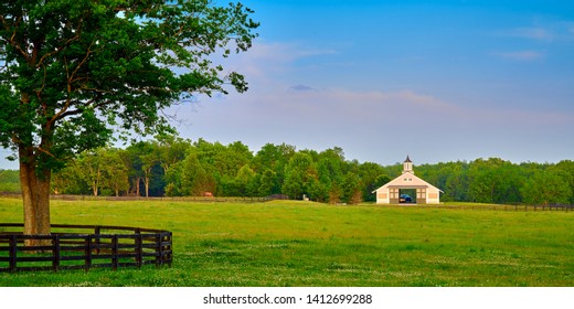 Kentucky Horse Barn With Field In The Foreground.