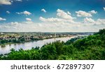 Kentucky and Ohio River with blue sky and clouds