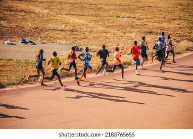 Kenyan Marathon Runners Train At The Athletics Track In The Town Of Eldoret Near Iten, The Center Of World Endurance Running. Preparation In Kenya For A Running Race