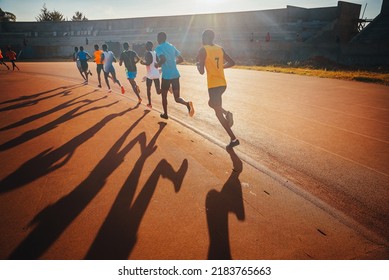 Kenyan Marathon Runners Train At The Athletics Track In The Town Of Eldoret Near Iten, The Center Of World Endurance Running. Preparation In Kenya For A Running Race