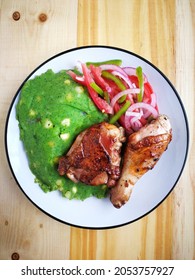 Kenyan Mukimo Served With Chicken And Salad. Kenyan Traditional Food.