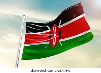 Kenyanational flag cloth fabric waving on the sky with beautiful sky - Image