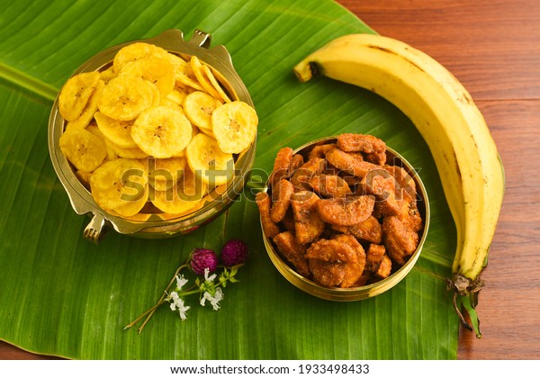 Kerala banana chips for Onam festival popular deep\
fried snack traditional South Indian tea time snack on banana leaf,\
Kerala India. fried in coconut oil on Onam, Vishu, Diwali\
Deepawali, Ramzan, Eid.