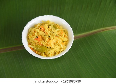 Kerala food for Onam festival special curry cabbage thoran or stir fry , Onam sadya , sadhya on green banana leaf background India. popular Sri Lankan food . South Indian vegetable curry