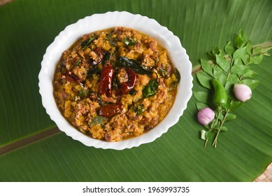 Kerala food for Onam festival special curry Erissery , Pumpkin curry , Mathanga Elissery Onam sadya , sadhya green banana leaf background India. popular Sri Lankan food .South Indian vegetable curry