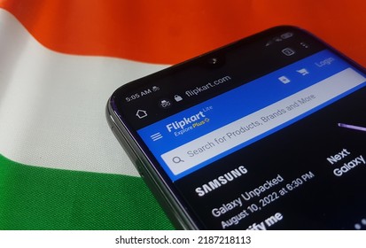 Kerala, India 07-Aug-2022 Flipkart lite pluse commerce site or website home page search engine bar opened in screen of smartphone, mobile or cellphone device browser isolated on Indian flag background