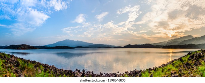 Kerala nature scenery panorama view of banasura sagar dam wayanad, awesome image of biggest earth dam during sunset
India travel and tourism concept photo, calm. River with mountains nature scenery 