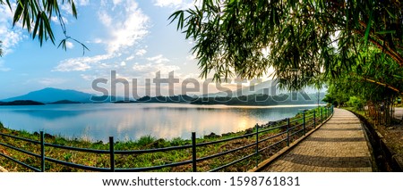 Kerala nature scenery travel and tourism concept, beautiful view of Banasura Sagar Dam  largest earth Dam in India panorama view of god's own country trees and awesome mountains, famous tourist spot