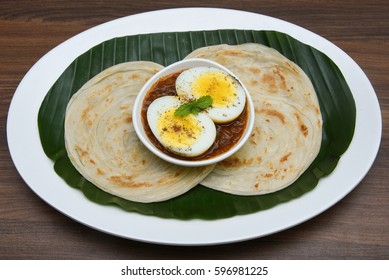 egg paratha images stock photos vectors shutterstock https www shutterstock com image photo kerala parathas porotta roti parotta barotta 596981225