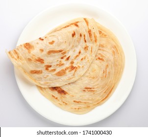 Kerala Porotta , Malabari Parotta,   India. Popular Street Food Use Maida Flour In Kerala, Tamil Nadu, Sri Lanka. Top View Of South Indian Food