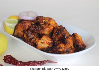 Kerala Style Dry Chicken Roast. Prepared Using Air Fryer. Shot On White Background