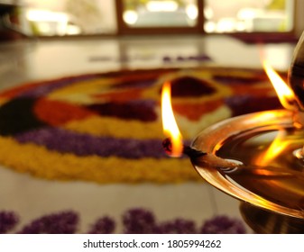 Kerala's Festival Flower Pattern With Traditional Kerala Lamp