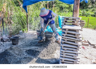 Kerinci, Jambi, Indonesia - 26 October 2020: the process of making bricks manually. Brick is a building material made from a mixture of sand, water, and cement which is compacted in a mold.