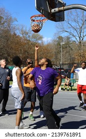 Kernersville North Carolina United States March 20, 2022 A Group Of Men Playing Outdoor Basketball At A Park