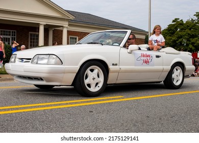 Kernersville North Carolina United States July 4, 2022 A White Car Driving Through The Fourth Of July Parade