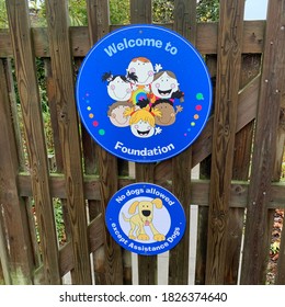 Kesgrave, Suffolk, UK - 3 October 2020: Signs On The School Gate - Welcome To Foundation But No Dogs Allowed.