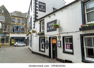 Keswick, UK - 9 June 2021: The Dog and Gun pub, Keswick, Lake District, Cumbria