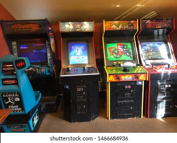Ketchum, Idaho - June 30, 2019: Game room in a restaurant with old 1980s vintage coin-operated arcade games to play - Shutterstock ID 1466684936