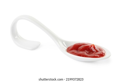 Ketchup In Ceramic Serving Spoon Isolated On White