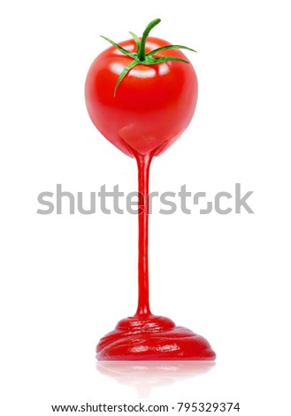 Ketchup flows from a fresh tomato. Conceptual composition of a tomato on a white background