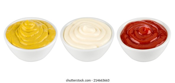 ketchup, mustard and mayonnaise in ceramic bowls