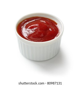 Ketchup In Ramekin On White Background