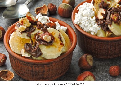 Keto Breakfast Or Dessert. Cottage Cheese With Banana, Hazelnuts And Chocolate Paste. Keto Diet.