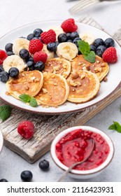 Keto Diet Pancakes Made Or Almond Flour, Served With Berries.