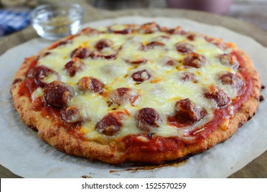 Keto Fathead Pizza With Mozzarella Crust And Pepperoni And Cheese Topping- A Set Of Photos Showing The Recipe Ingredients, Method And The Final Dish