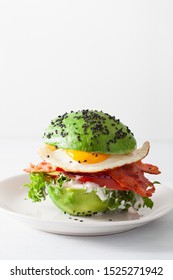 Keto Paleo Diet Avocado Breakfast Burger With Bacon, Egg, Tomato